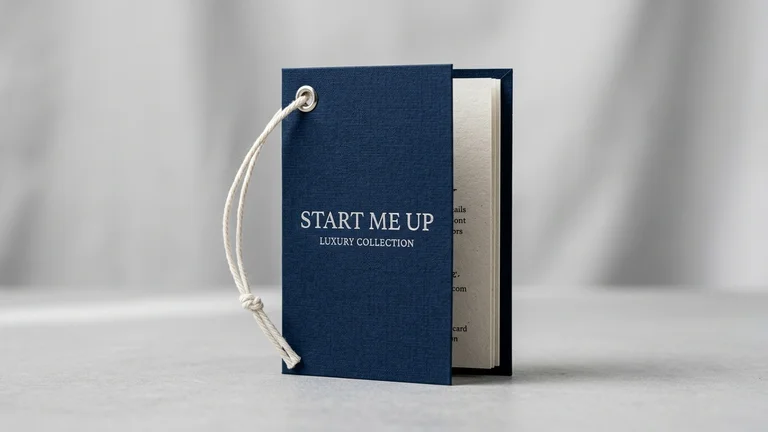 Standing luxury midnight navy folded swing tag booklet with eyelet and white string.