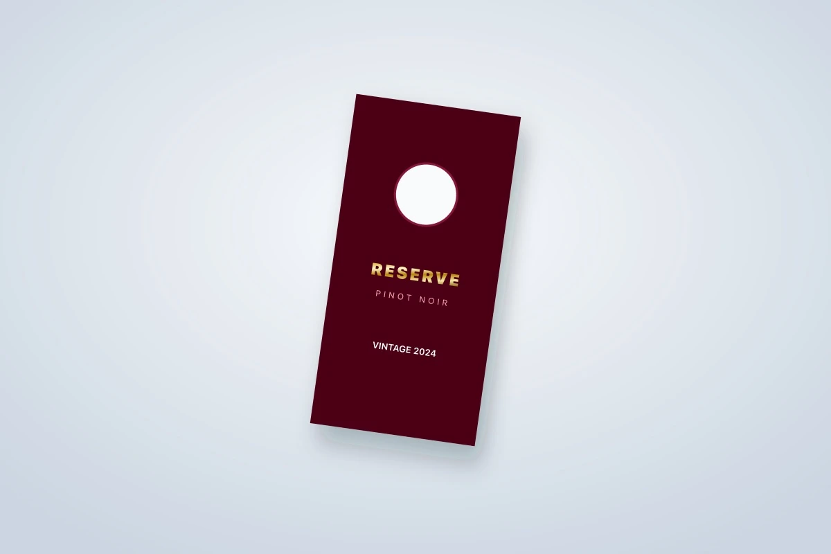 Red reserve wine bottle neck tag printed for a 2024 vintage