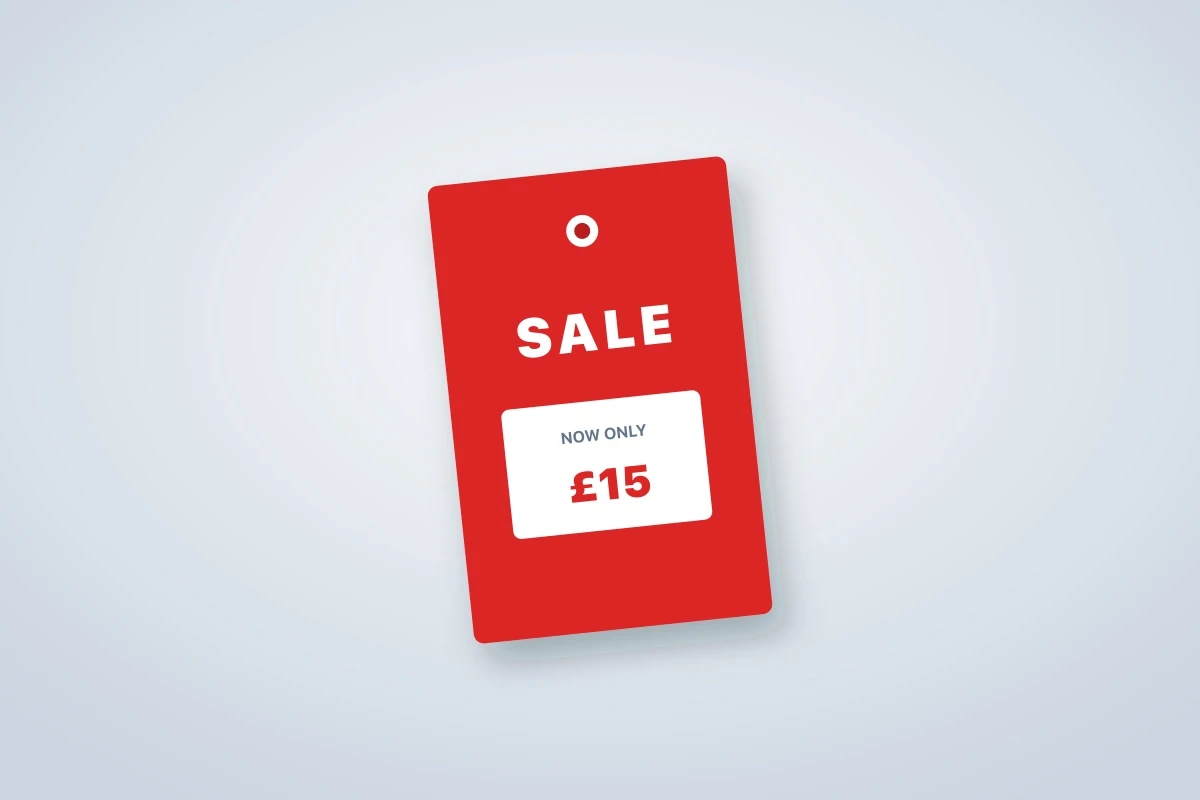 Red rectangular sale swing tag with a clear price panel